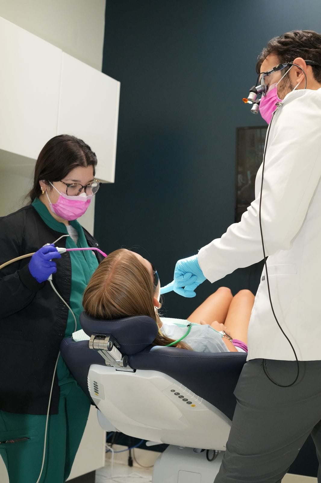 Dental team providing chairside care at Spring Hope Family Dentistry