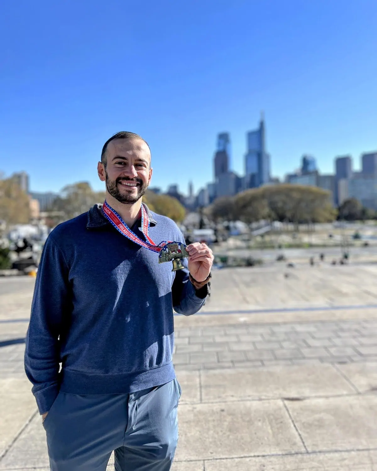 Dr. Elie Abboud with his finisher medal at the Philadelphia Marathon
