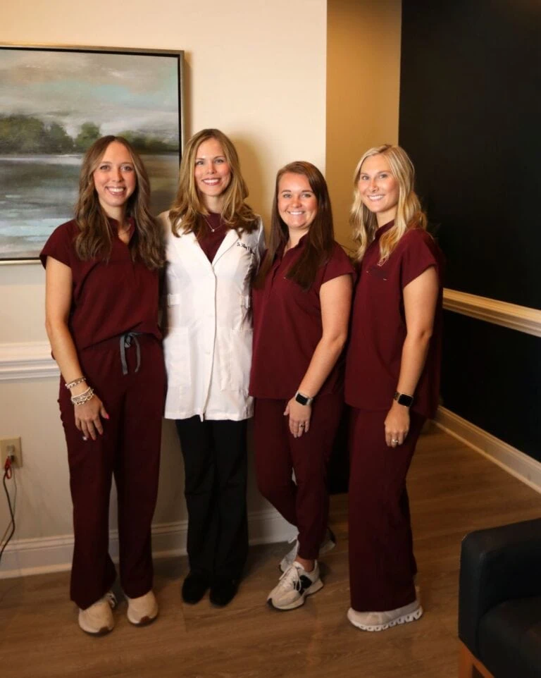 Dr. Hilary Patterson with three clinical team members at Spring Hope Family Dentistry