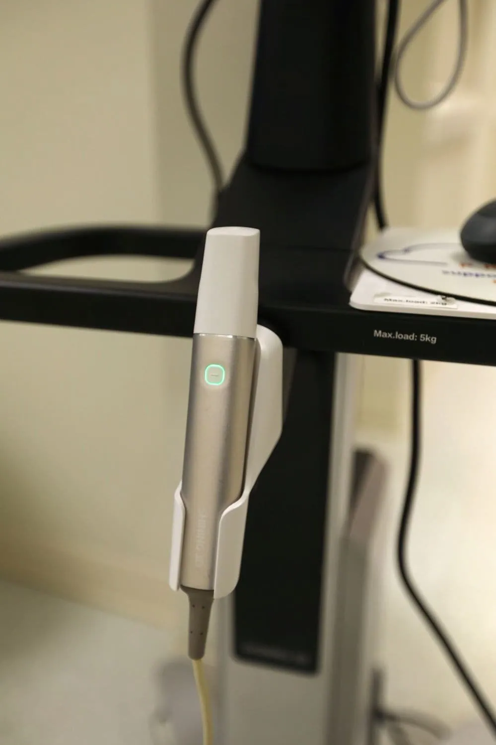 Intraoral scanner used to take digital impressions for new crowns instead of impression trays at Spring Hope Family Dentistry