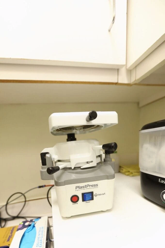 Thermoformer used to make clear retainers and night guards in the office